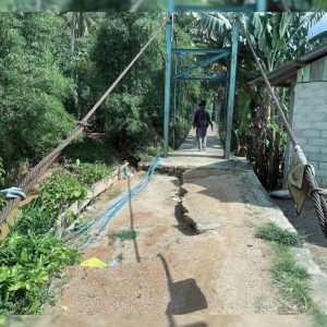 Akses Warga Terancam, Brimob Sumut Lakukan Pengecekan Jembatan Gantung di Tukka