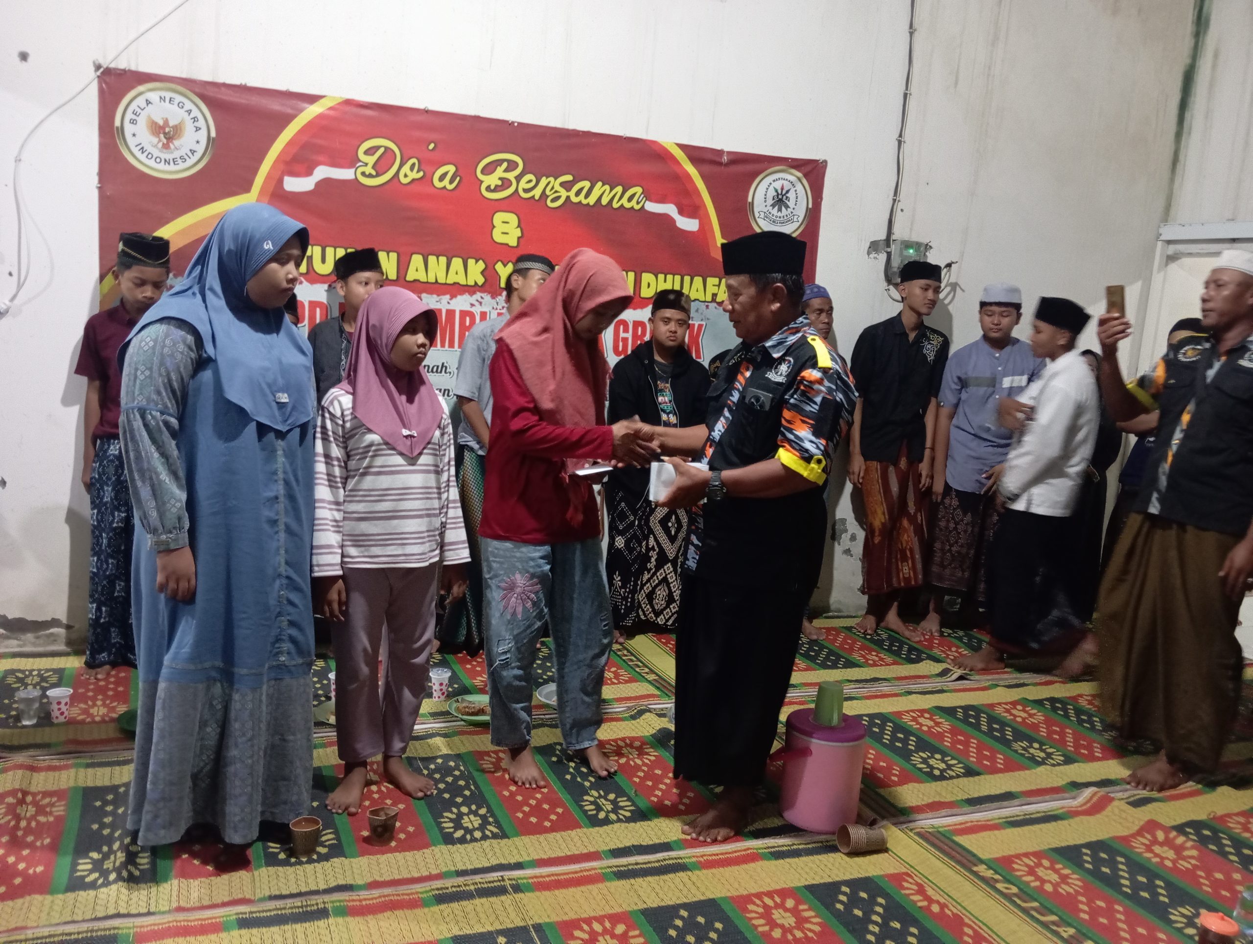 Santunan Anak yatim Piyatuh Awal Tahun GMBI distrik Gresik