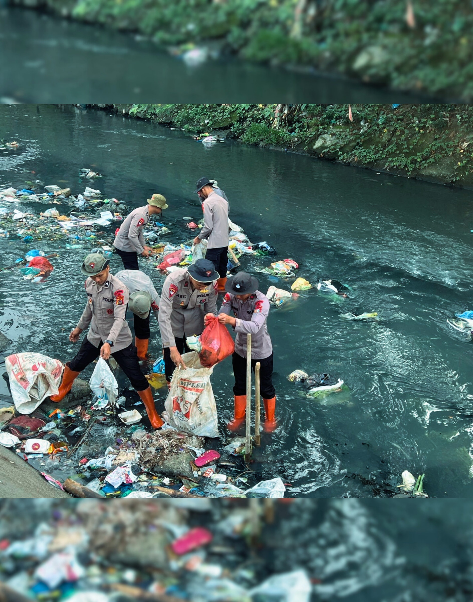 Peduli Lingkungan, Brimob Polda Sumut Angkat Sampah dari Sungai Demi Warga