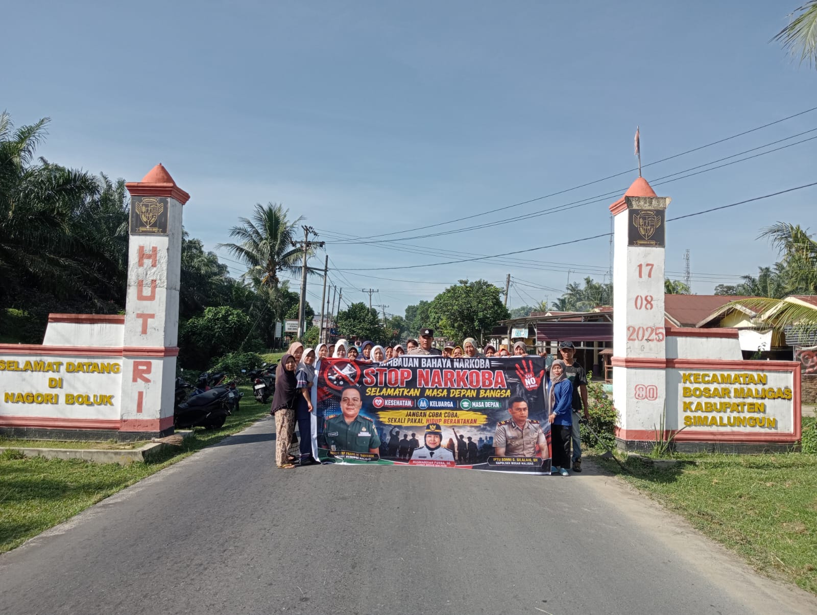 Kapolsek Bosar Maligas Gelar Gotong Royong dan Sosialisasi Anti – Narkoba, Warga Nagori Boluk Nyatakan Komitmen Perangi Narkoba