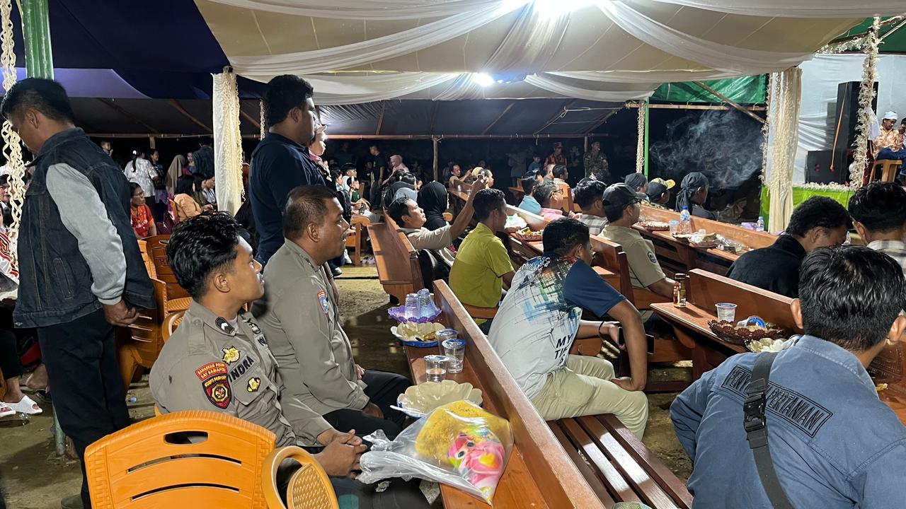 Dukung Ketahanan Pangan Polsek Sangkulirang Bersama Petani Desa Tepian Terap Pesta Panen